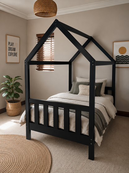 Black house-shaped bed in a bedroom with neutral decor