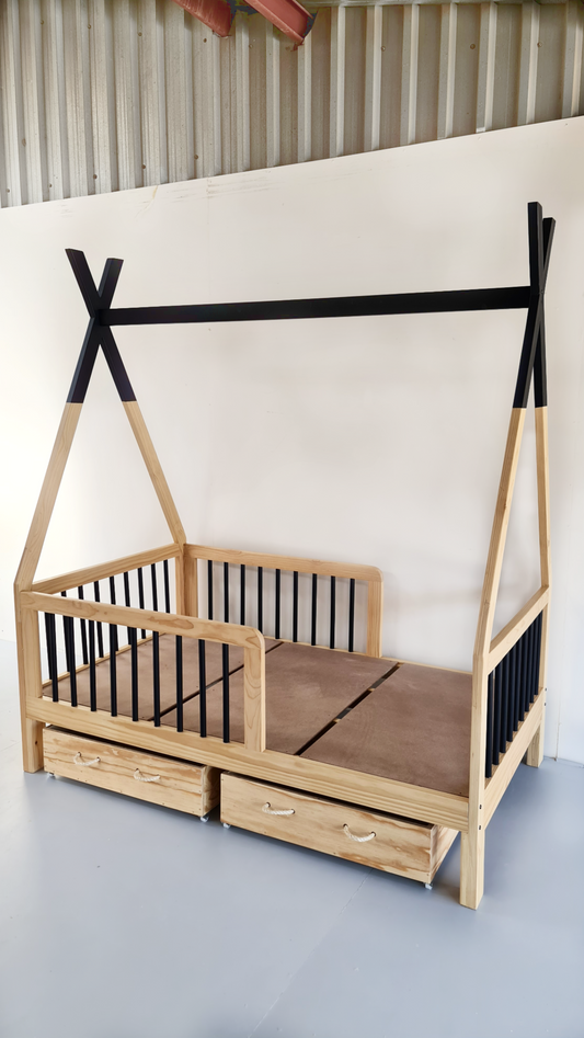 A Bamboo Teepee Bed with natural wood color and black rod rail supports. The bed is shown with storage drawers and a mattress, set against a plain background.
