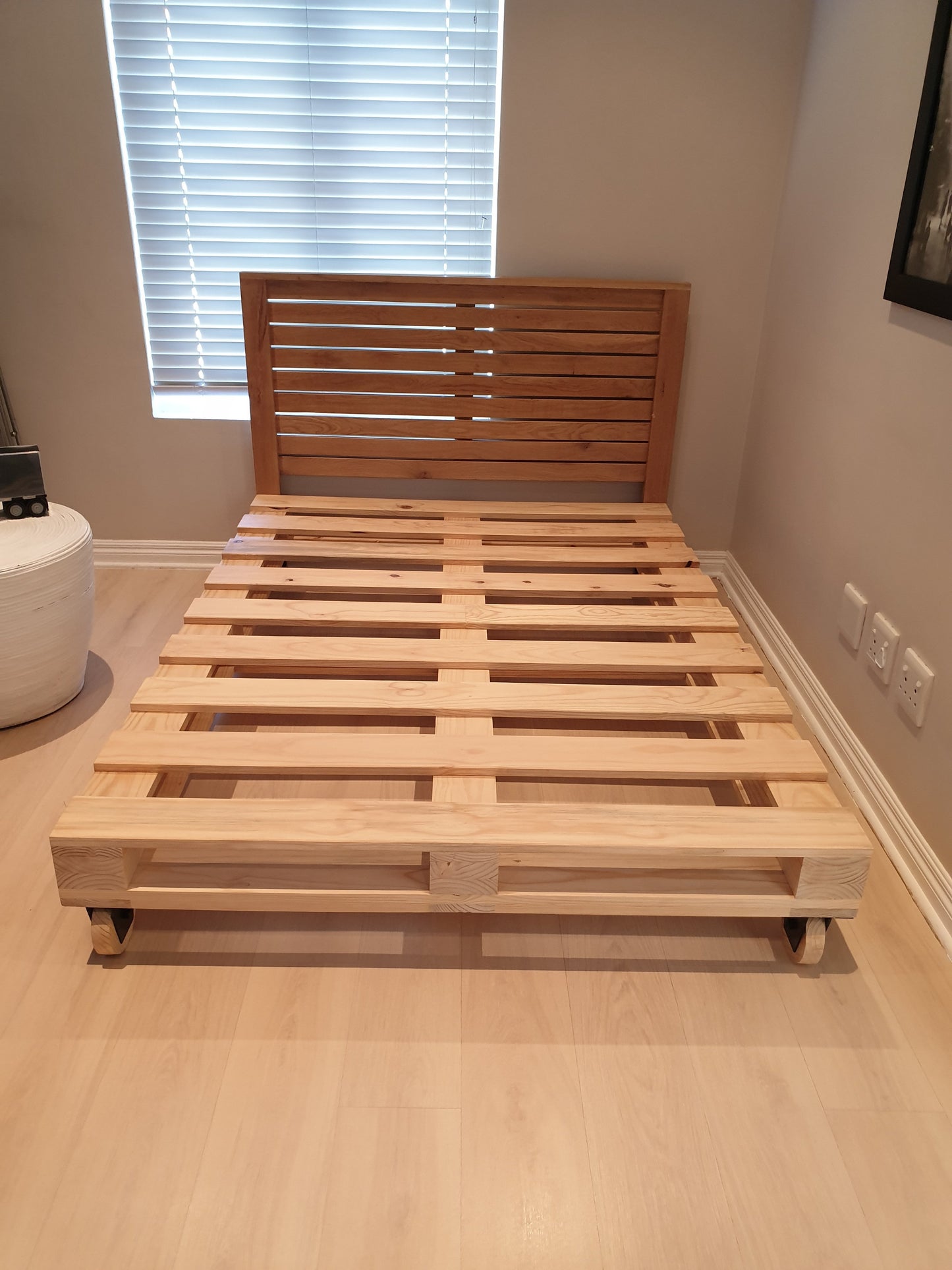 Crafted Pallet Wheel Bed - Furniture