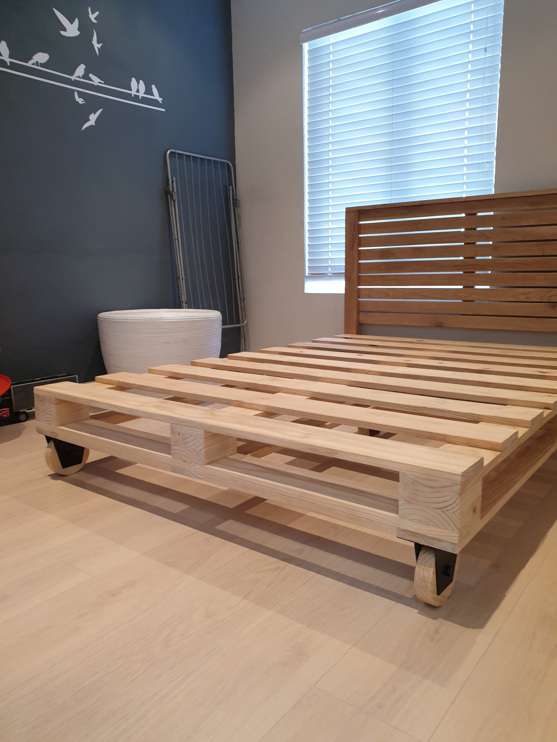 Crafted Pallet Wheel Bed - Furniture